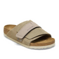 the Kyoto slide offers effortless comfort with a suede upper, nubuck leather straps, and an adjustable hook-and-loop closure for a perfect fit. 