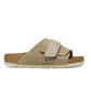 the Kyoto slide offers effortless comfort with a suede upper, nubuck leather straps, and an adjustable hook-and-loop closure for a perfect fit. 