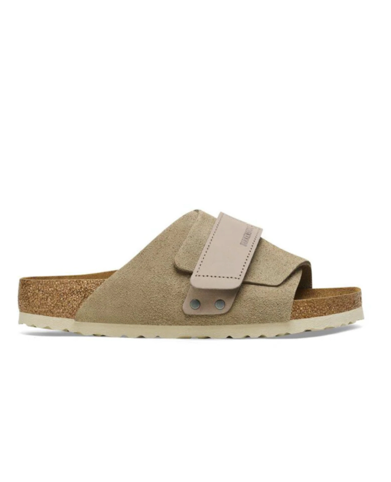 the Kyoto slide offers effortless comfort with a suede upper, nubuck leather straps, and an adjustable hook-and-loop closure for a perfect fit. 