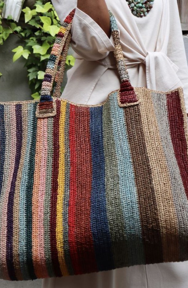 this roomy "weekender" bag can be used as an everyday companion in or out of town, at the beach and/or for traveling.
gabriele frantzen bags are hand crocheted by skilled artisans in madagascar.
composition
raffia is a 100% natural fiber made from raffia palm leaves and is fully recyclable.