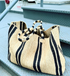Gabriele Frantzen weekender striped bag, vacation mode raffia bag 