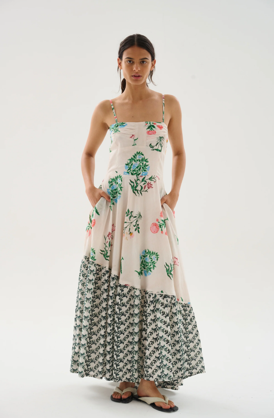The Valery Midi Dress is crafted from airy cotton voile for a light, flowing silhouette. Featuring slender straps, a square neckline, and a fitted bodice that gives way to a soft, asymmetric drape, this dress embodies femininity. Side pockets add a practical touch, making it a perfect choice.

100% Cotton Voile.


Hand wash with cool water. Do not bleach. Soft Iron. Do not twist. Dry flat in the shade.