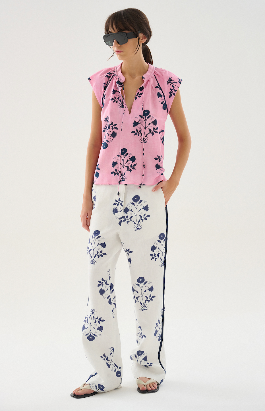 Lightweight and airy, this cotton-silk voile top features a flattering V-neckline framed by soft gathers for subtle volume. Designed with raglan sleeves for a relaxed yet refined silhouette, it's an effortless piece that blends comfort with sophistication.

80% Cotton 20% Silk Voile. 


Do not wash. Do not bleach. Do not iron. Do not tumble dry. Dry clean only. 

Fitting advice - Regular fit.