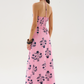 A flowing maxi dress in cotton silk voile, designed for movement and ease. The gathered bodice adds soft texture, while the smocked back ensures a flexible fit. Defined by its effortless drape and floral print. 

80% Cotton 20% Silk Voile.

Do not wash. Do not bleach. Do not iron. Do not tumble dry. Dry clean only. 

Fitting advice - Slim fit.