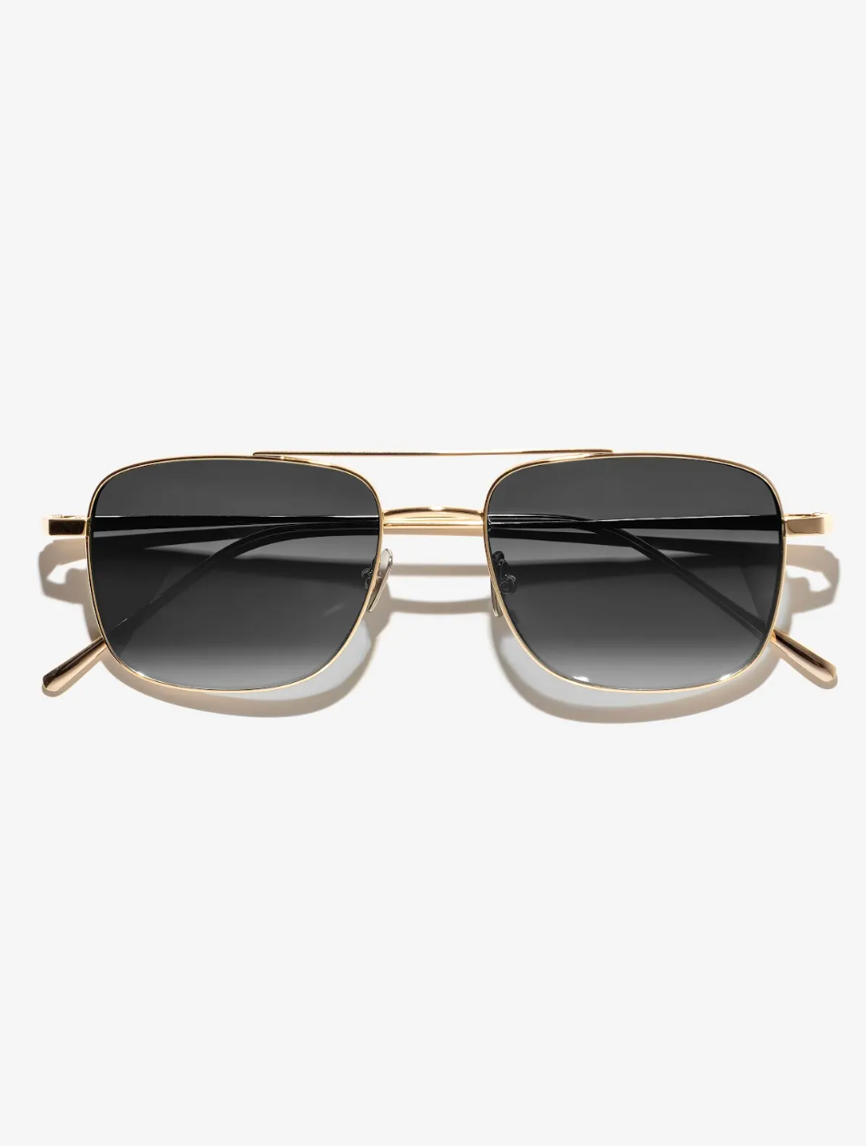 The Danger Zone 2.0 frame in Gold.

Handcrafted Frames- Gold stainless steel frame- 3 barrel stainless steel hinges

Lenses- 70's inspired gradient lenses- UV400 treated to protect your eyes from all harmful UVA and UVB light - Anti reflective coatings applied to the backside of the lens - Anti scratch coatings

Size: 54-18-150

Waid exceeds all safety requirements for FDA and CE standards.

Lens Colour: Grey