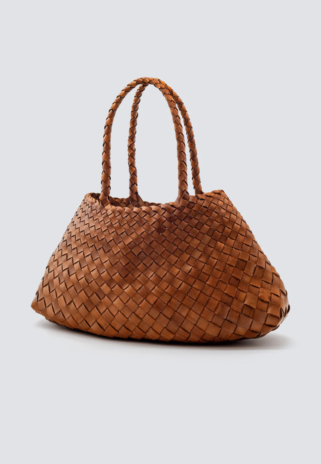 Brown woven handbag on a light gray background