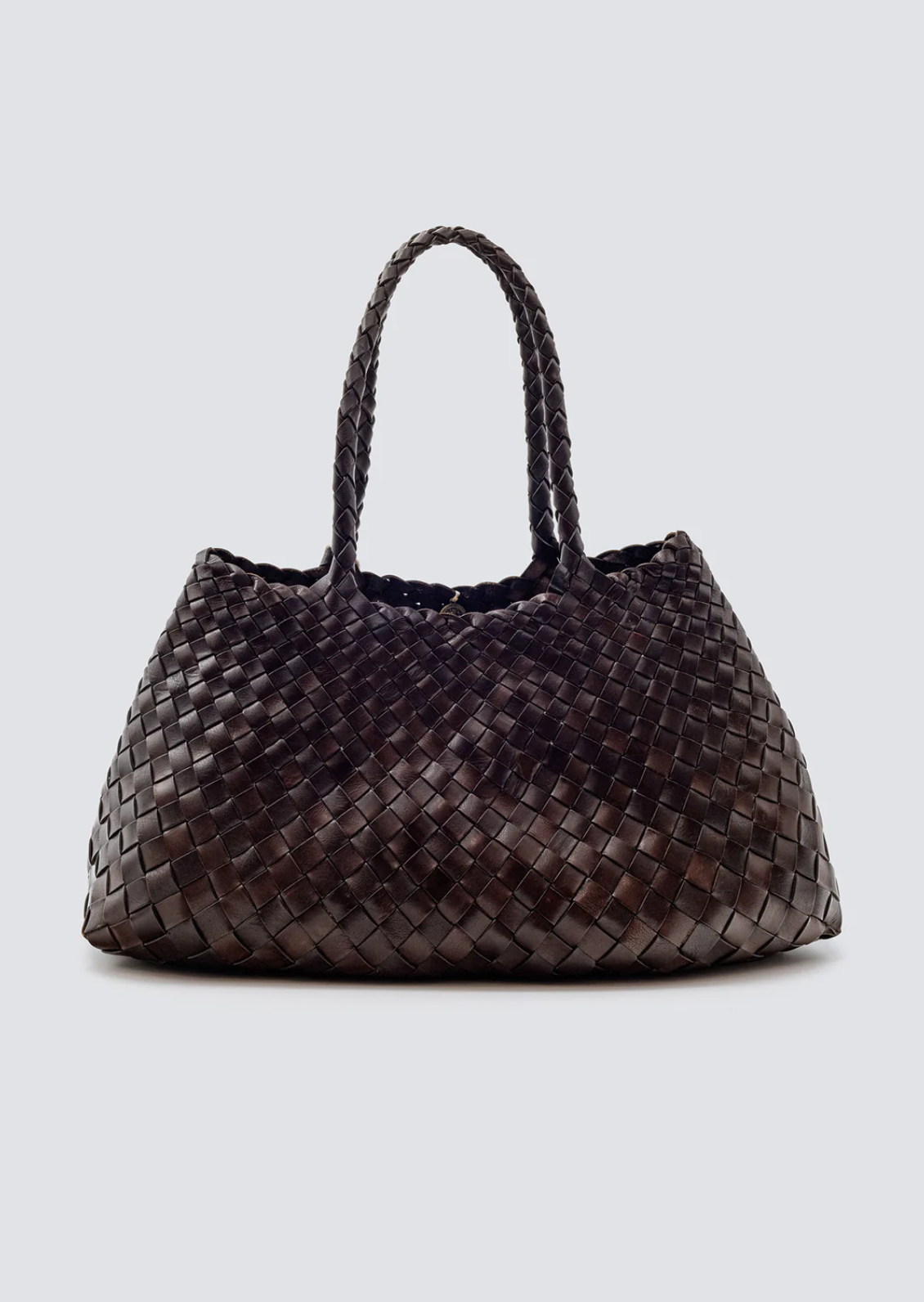 Woven handbag on a light gray background