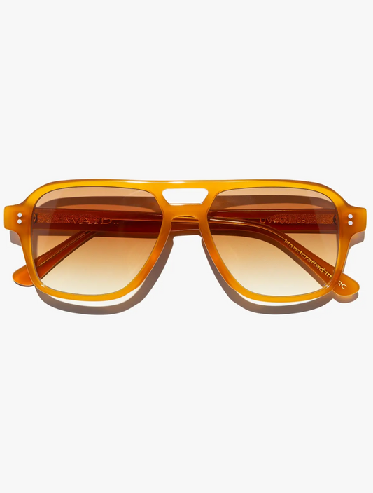 The Good Vibrations frame in black with grey gradient or honey frame/gold gradient. Handcrafted Frames- Italian Mazzucchelli acetate- Adjustable wire core temple arms- 7 barrel stainless steel hinges- 2 dot rivets for added durability

UV400 treated to protect your eyes from all harmful UVA and UVB light - Anti reflective coatings applied to the backside of the lens - Anti scratch coatings

Size: 53-16-145