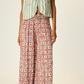easy and chic lounge pants.

elastic waist with tasseled tie, pockets, and loose wide legs.

Hits above the ankle.