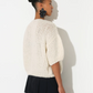 maiami is renown for its hand-knitted luxury knitwear, blending traditional craftsmanship with modern design. This bomber cardigan is made from cotton and alpaca. It is a nice weight from spring, into summer. 