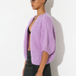 maiami is renown for its hand-knitted luxury knitwear, blending traditional craftsmanship with modern design. This bomber cardigan is made from cotton and alpaca. It is a nice weight from spring, into summer. 