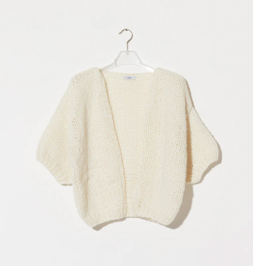 maiami is renown for its hand-knitted luxury knitwear, blending traditional craftsmanship with modern design. This bomber cardigan is made from cotton and alpaca. It is a nice weight from spring, into summer. 