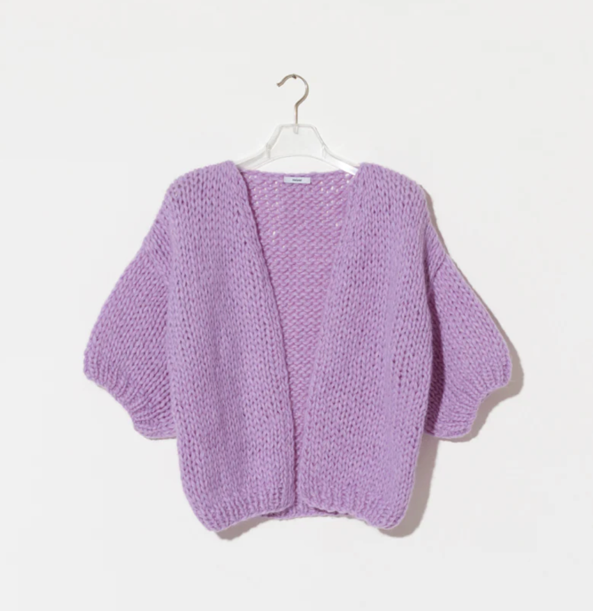 maiami is renown for its hand-knitted luxury knitwear, blending traditional craftsmanship with modern design. This bomber cardigan is made from cotton and alpaca. It is a nice weight from spring, into summer. 