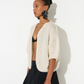 maiami is renown for its hand-knitted luxury knitwear, blending traditional craftsmanship with modern design. This bomber cardigan is made from cotton and alpaca. It is a nice weight from spring, into summer. 