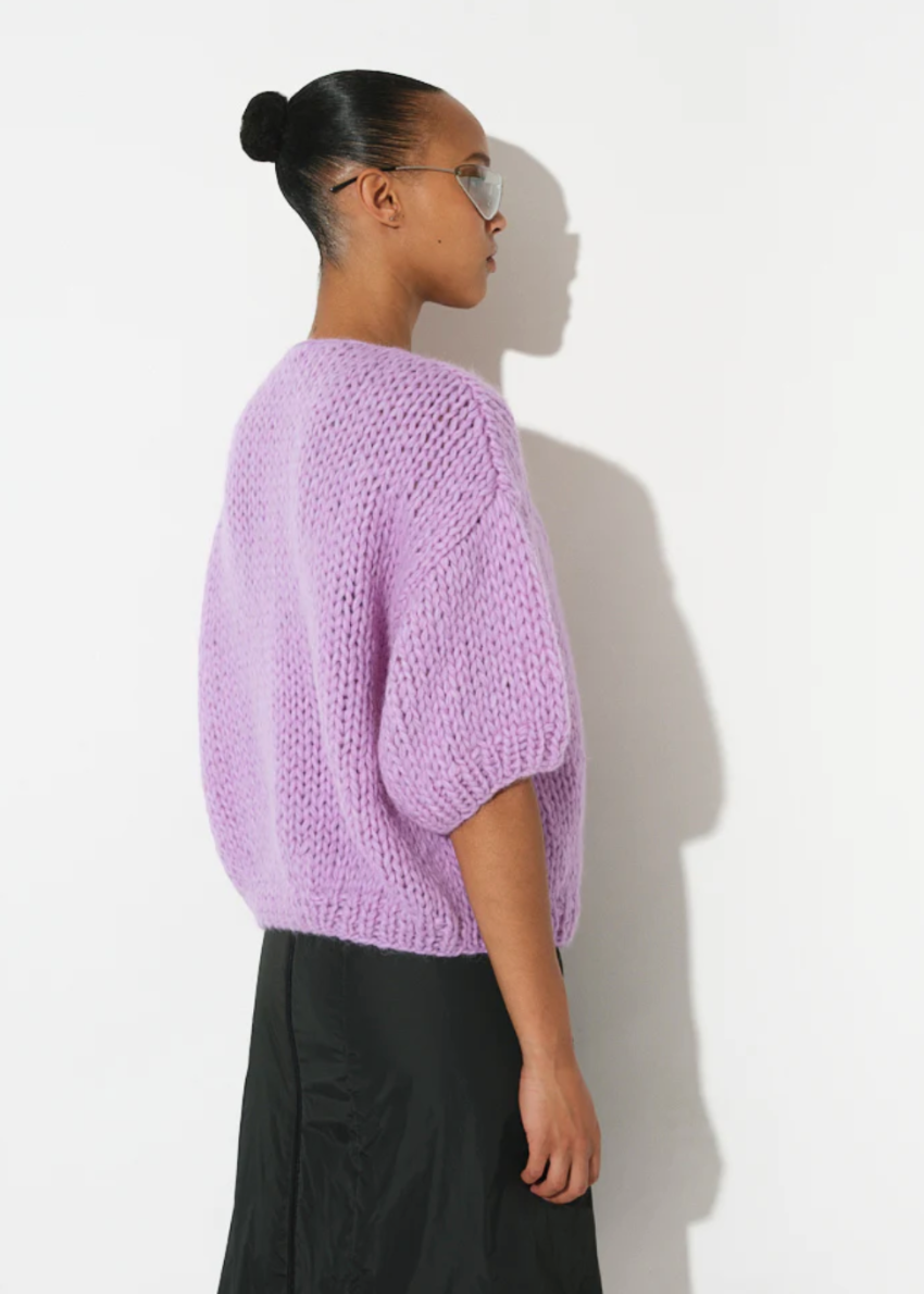 maiami is renown for its hand-knitted luxury knitwear, blending traditional craftsmanship with modern design. This bomber cardigan is made from cotton and alpaca. It is a nice weight from spring, into summer. 