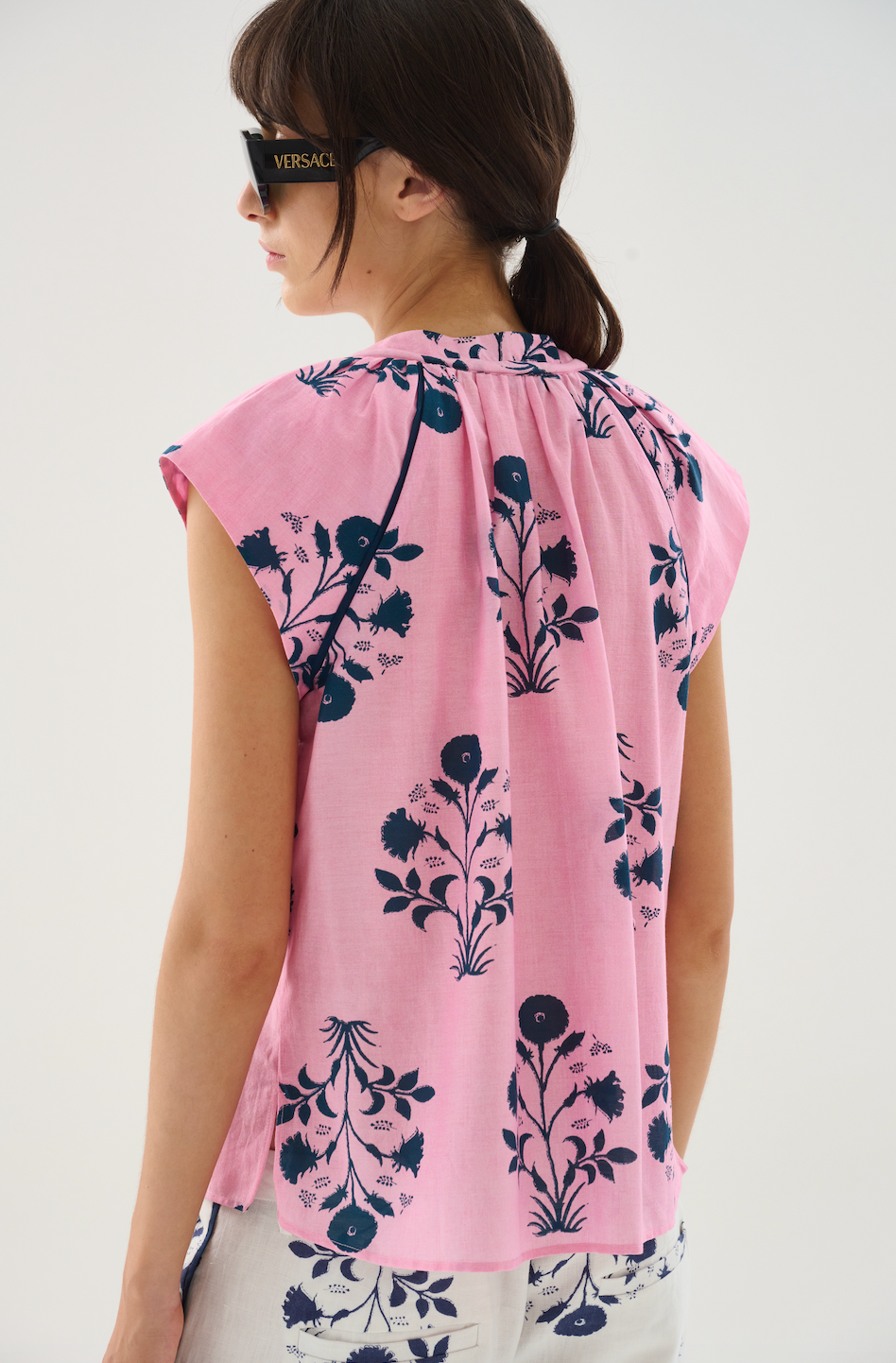 Lightweight and airy, this cotton-silk voile top features a flattering V-neckline framed by soft gathers for subtle volume. Designed with raglan sleeves for a relaxed yet refined silhouette, it's an effortless piece that blends comfort with sophistication.

80% Cotton 20% Silk Voile. 


Do not wash. Do not bleach. Do not iron. Do not tumble dry. Dry clean only. 

Fitting advice - Regular fit.