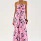 A flowing maxi dress in cotton silk voile, designed for movement and ease. The gathered bodice adds soft texture, while the smocked back ensures a flexible fit. Defined by its effortless drape and floral print. 

80% Cotton 20% Silk Voile.

Do not wash. Do not bleach. Do not iron. Do not tumble dry. Dry clean only. 

Fitting advice - Slim fit.