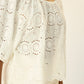Scoop neck blouse with loose fit.
Puff sleeves with elastic cuffs.