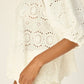 Scoop neck blouse with loose fit.
Puff sleeves with elastic cuffs.