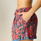 Shorts with elastic drawstring waist. Features pockets.