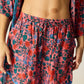 Shorts with elastic drawstring waist. Features pockets.