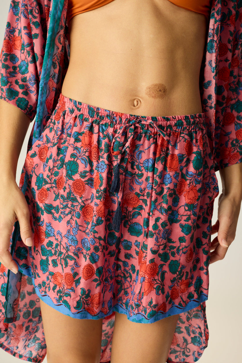 Shorts with elastic drawstring waist. Features pockets.