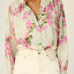 long sleeve button down shirt with band collar. flat cuffs with button closure at wrist. slightly pleated under collar and at shoulders to add fullness.