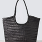 The "NS Diagonal Triple Jump" is a shoulder bag that stands out with its handwoven buffalo calf leather and stylish vertical design. It's deep, unlined, and has an open top, making it easy to fit everything you need. The braided handles not only look great but are comfortable to carry too. This bag gives off Nantucket tote vibes but in a fresh, vertical twist. It’s perfect for anyone looking for a blend of casual elegance and practicality.
