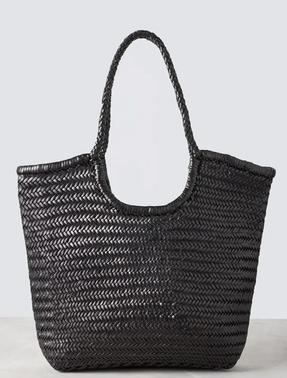 The "NS Diagonal Triple Jump" is a shoulder bag that stands out with its handwoven buffalo calf leather and stylish vertical design. It's deep, unlined, and has an open top, making it easy to fit everything you need. The braided handles not only look great but are comfortable to carry too. This bag gives off Nantucket tote vibes but in a fresh, vertical twist. It’s perfect for anyone looking for a blend of casual elegance and practicality.
