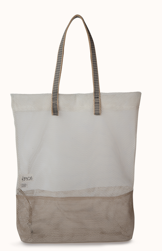 The Bi-Color B Bag showcases Épice’s signature colour combinations, offering a minimalist aesthetic. Its versatile design makes it suitable for various occasions, from daily errands to beach outings.
Crafted from durable materials, the bag ensures longevity while maintaining a lightweight feel, characteristic of Épice’s commitment to quality.
Equipped with woven handles, the bag can be comfortably carried by hand or over the shoulder.