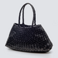 The Santa Croce bag is formed of irregular leather weaving straps that taper towards the brim, creating a practical yet elegant shape that’s perfect for running around the city—taking your outfit from day to night. Remaining true to traditional basket weaving techniques, the Santa Croce comes unlined and has an open top.

An antiqued St. Christopher medal charm, in homage to the patron saint of travellers, is hand-sewn inside each and every Dragon Diffusion bag—our brand’s very own seal of authenticity.