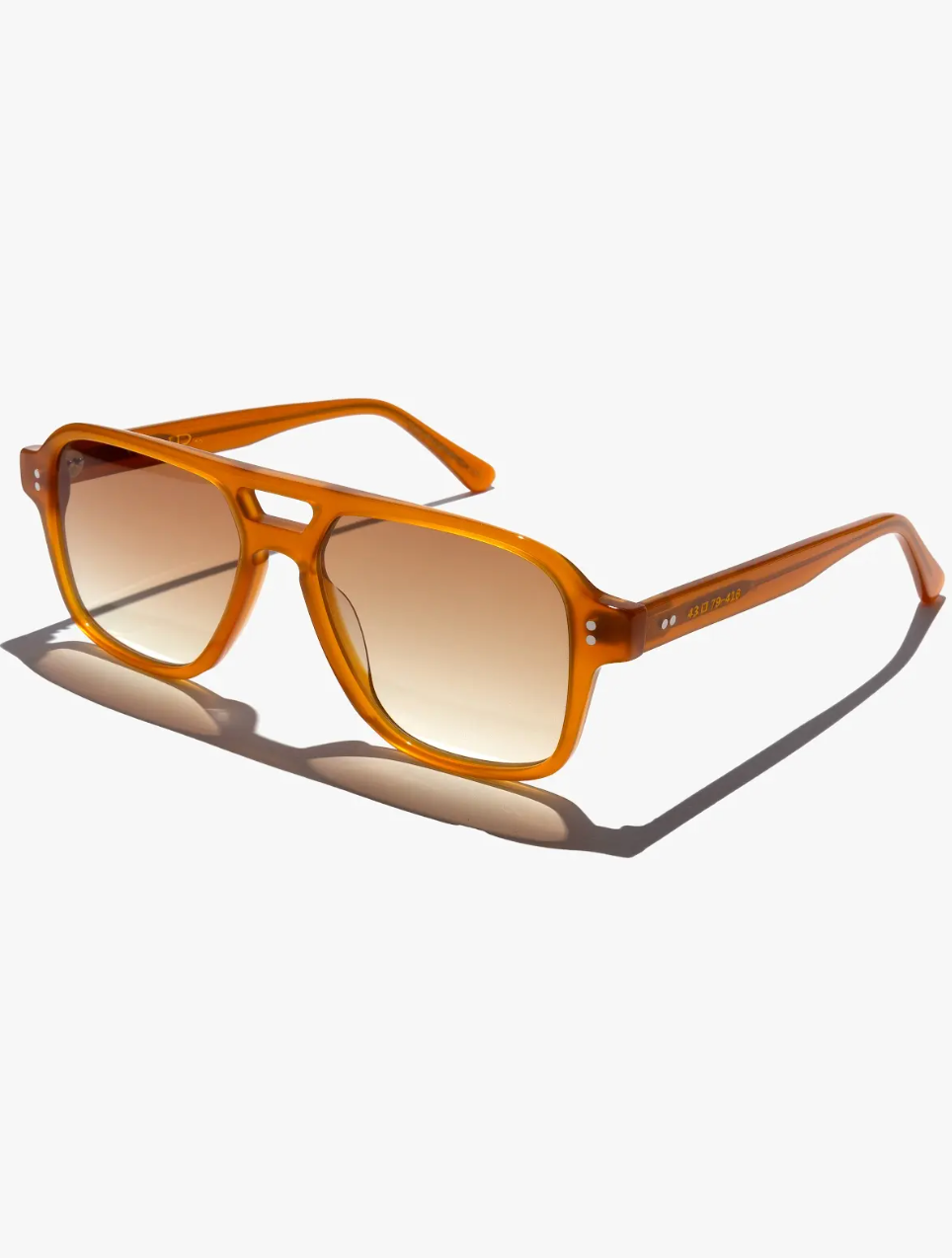 The Good Vibrations frame in black with grey gradient or honey frame/gold gradient. Handcrafted Frames- Italian Mazzucchelli acetate- Adjustable wire core temple arms- 7 barrel stainless steel hinges- 2 dot rivets for added durability

UV400 treated to protect your eyes from all harmful UVA and UVB light - Anti reflective coatings applied to the backside of the lens - Anti scratch coatings

Size: 53-16-145