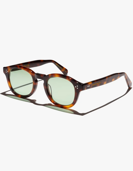 The Paradise City frame in a leopard tortoise with yellow lenses.

Handcrafted Frames- Italian Mazzucchelli acetate- Adjustable wire core temple arms- 5 barrel stainless steel hinges- 3 dot rivets for added durability

The Lenses-Polarized CR-39 lenses - UV400 treated to protect your eyes from all harmful UVA and UVB light - Anti reflective coatings applied to the backside of the lens - Anti scratch coatings

Size: 47-23-145