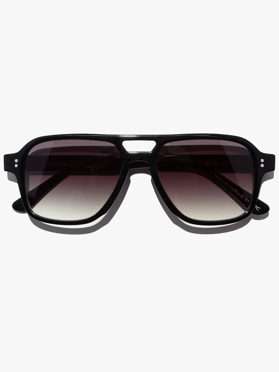 The Good Vibrations frame in black with grey gradient or honey frame/gold gradient. Handcrafted Frames- Italian Mazzucchelli acetate- Adjustable wire core temple arms- 7 barrel stainless steel hinges- 2 dot rivets for added durability

UV400 treated to protect your eyes from all harmful UVA and UVB light - Anti reflective coatings applied to the backside of the lens - Anti scratch coatings

Size: 53-16-145