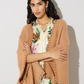the bella cardigan is a versatile piece, easy to combine with casual and more dressed up looks. one size fits most.
