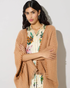 the bella cardigan is a versatile piece, easy to combine with casual and more dressed up looks. one size fits most.