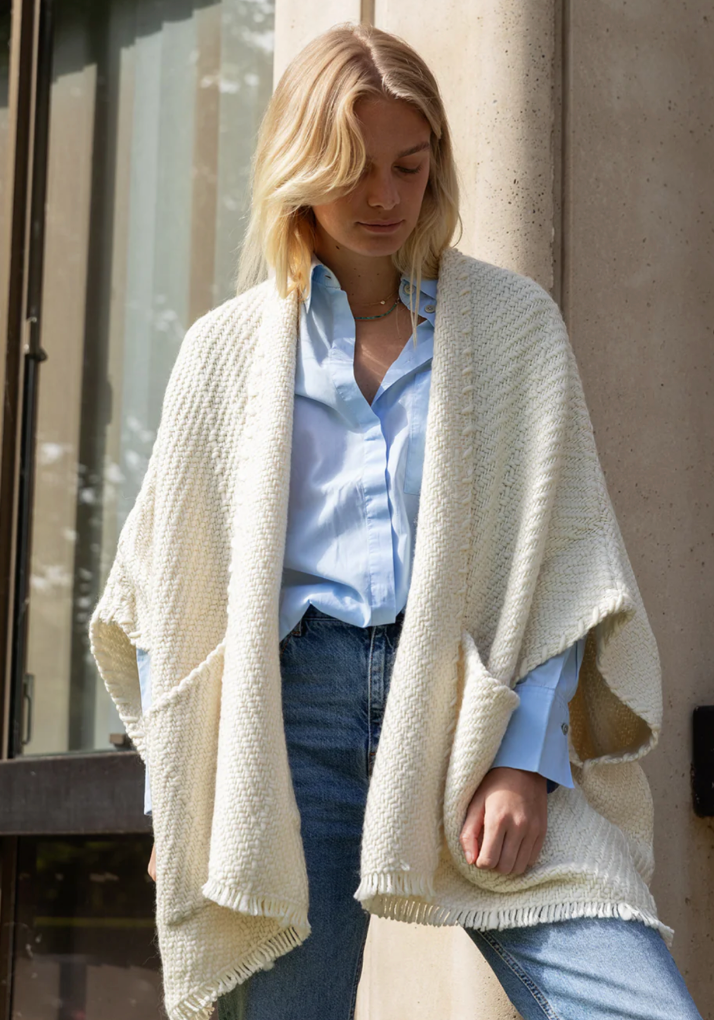 the billy cardigan is your perfect companion piece with its pockets on the front. one size fits most.