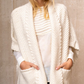 the billy cardigan is your perfect companion piece with its pockets on the front. one size fits most.